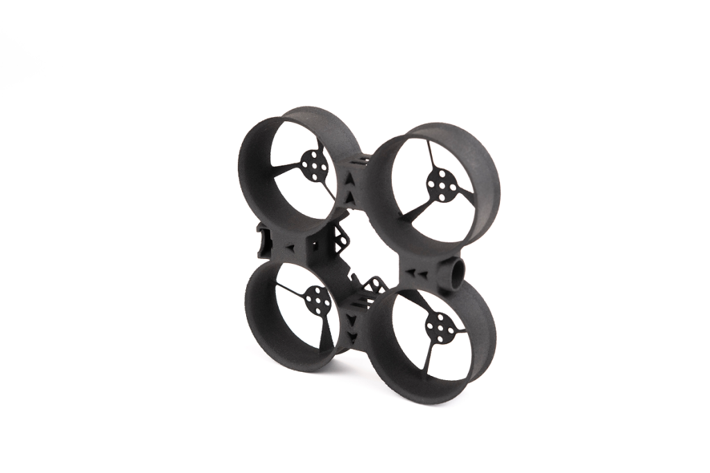 3D printed drone frame part made with SLS additive manufacturing.