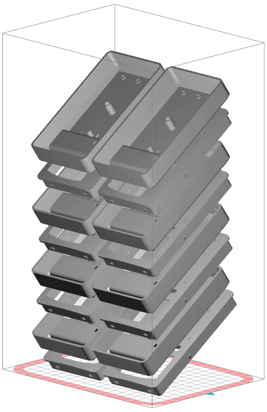 3D preview of multiple stacked parts arranged vertically inside the SLS printing chamber on the build platform
