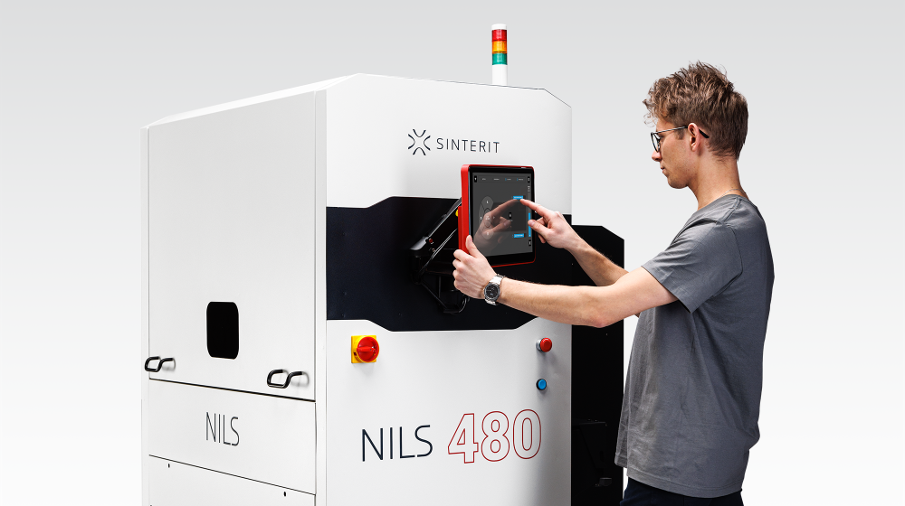 engineer using industrial 3d printer nils 480